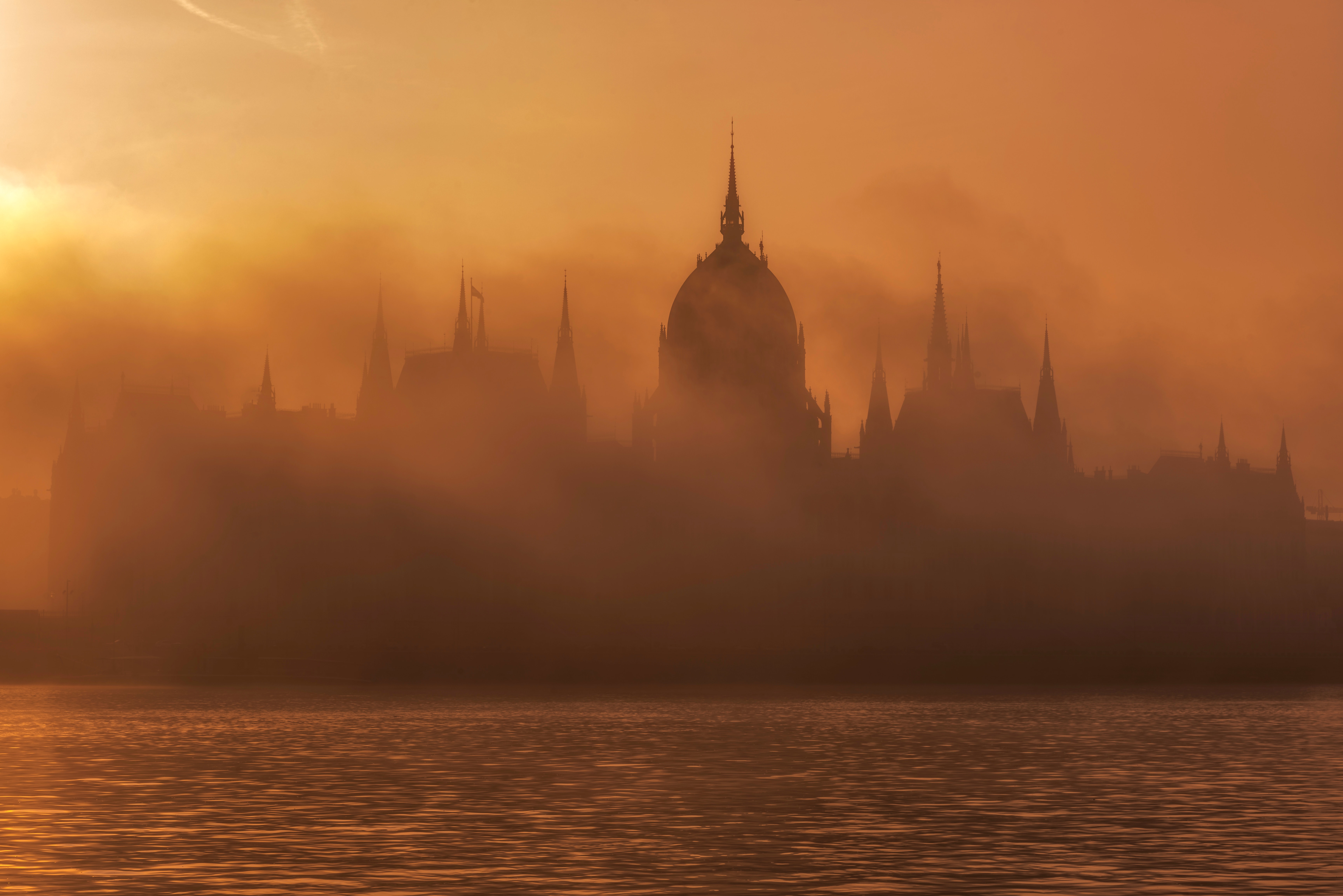 Hungarian Parliament in fog at sunrise