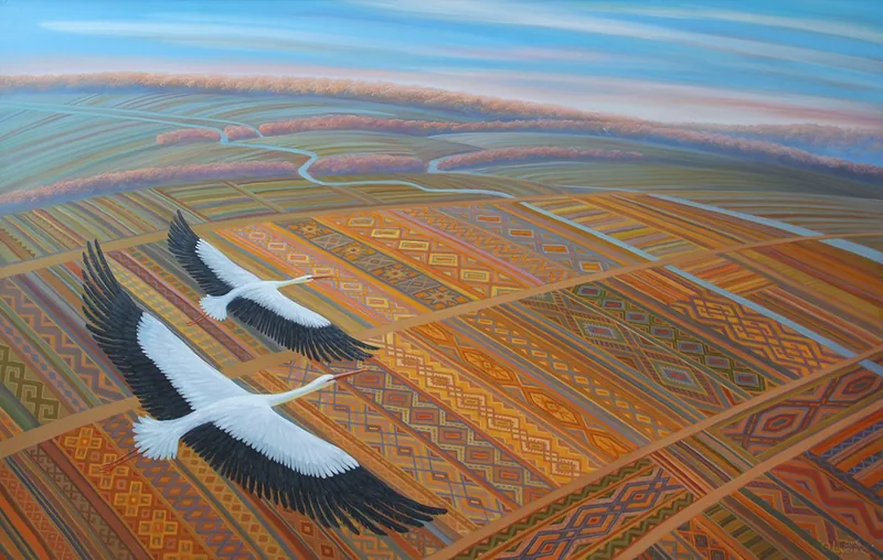 Aerial view of farmland woven into Ukrainian folk embroidery patterns, with two white storks flying at the lower left